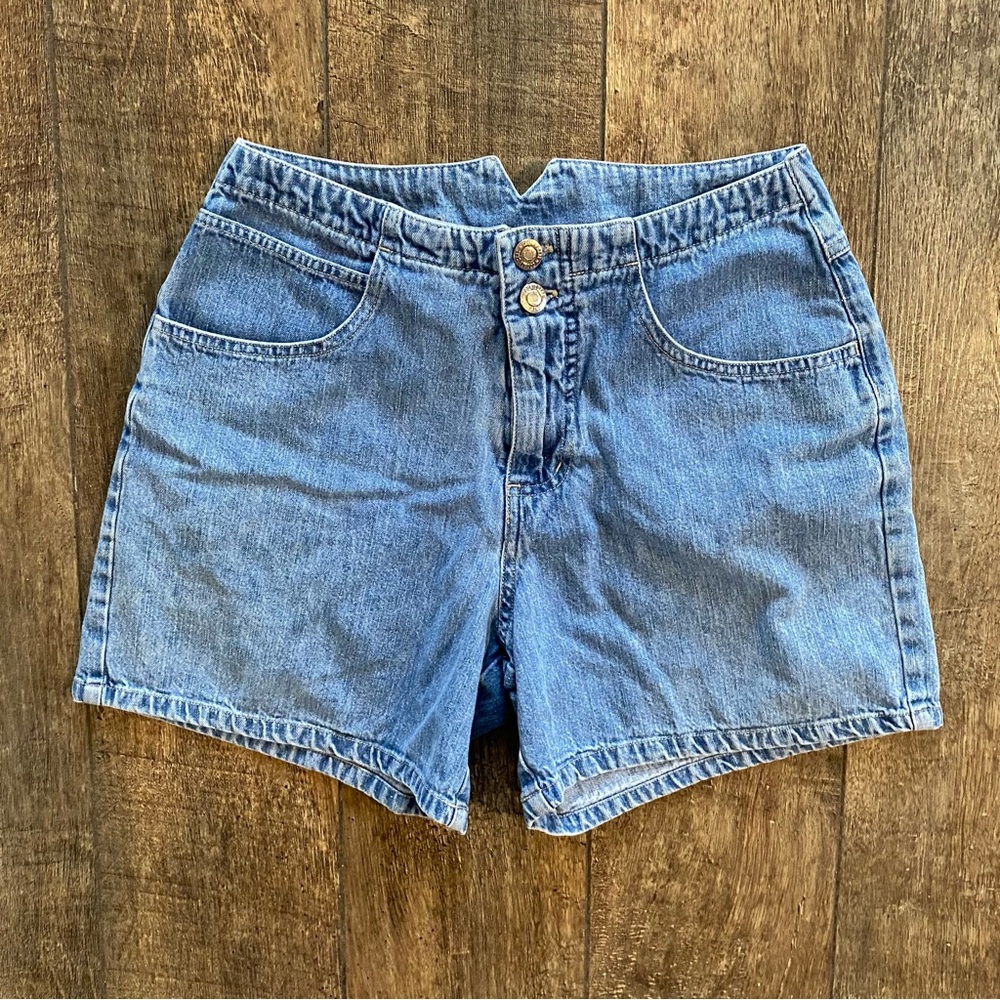 vintage high-waisted light wash denim shorts with silver waist cinch
